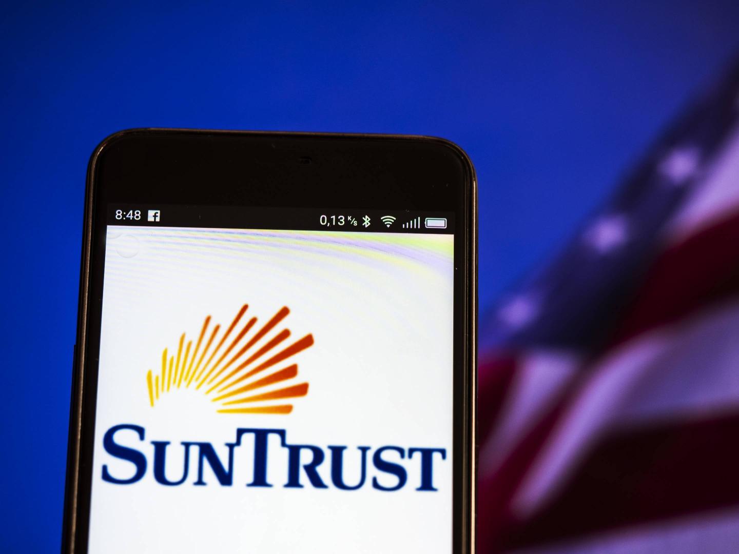 Sun Trust Bank logo seen displayed on a smart phone