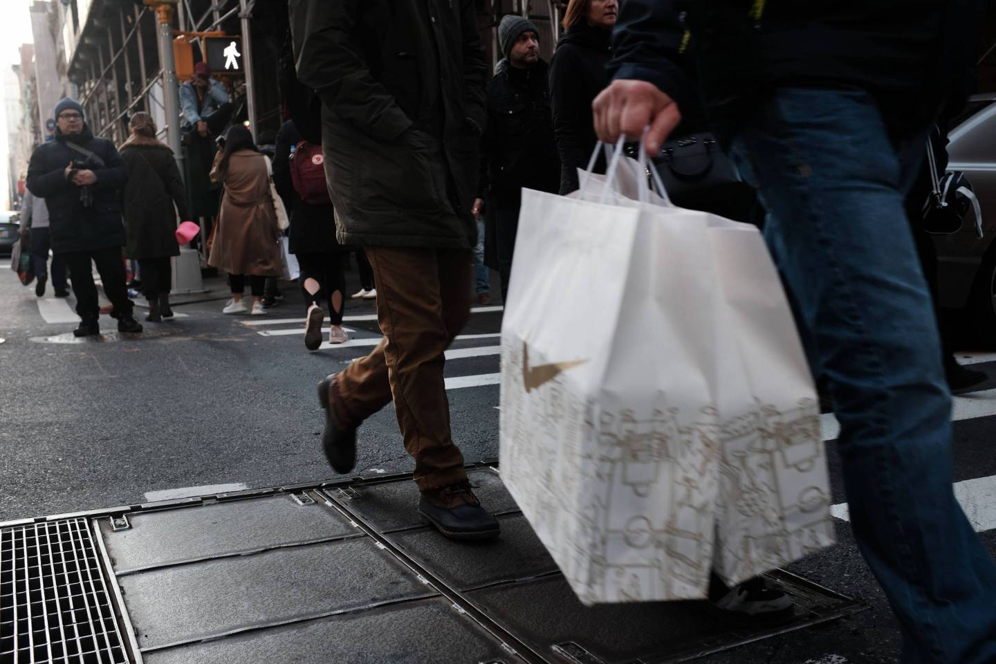 Last Minute Holiday Shoppers Hit The Stores in Manhattan