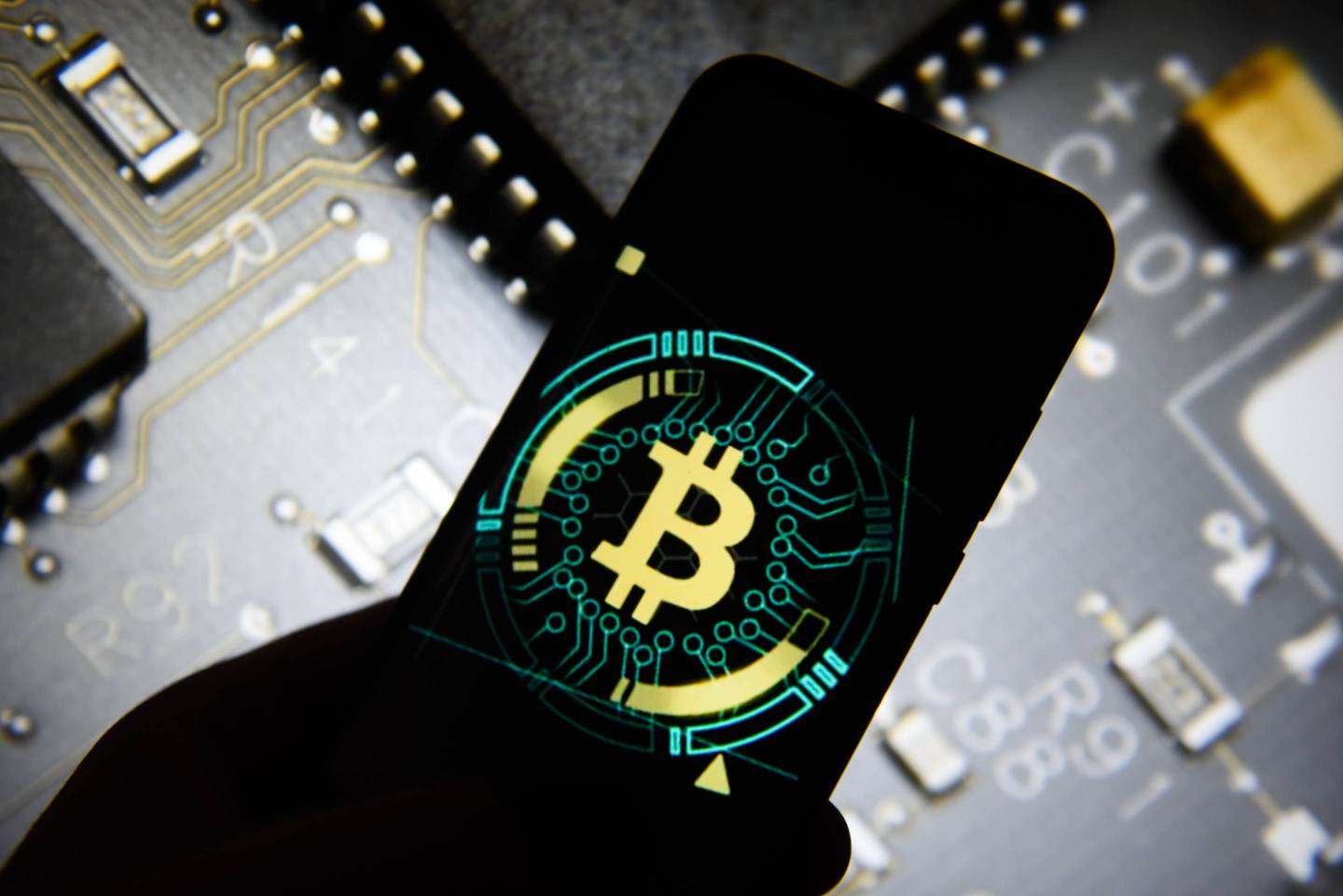 Bitcoin logo is seen on an android mobile phone