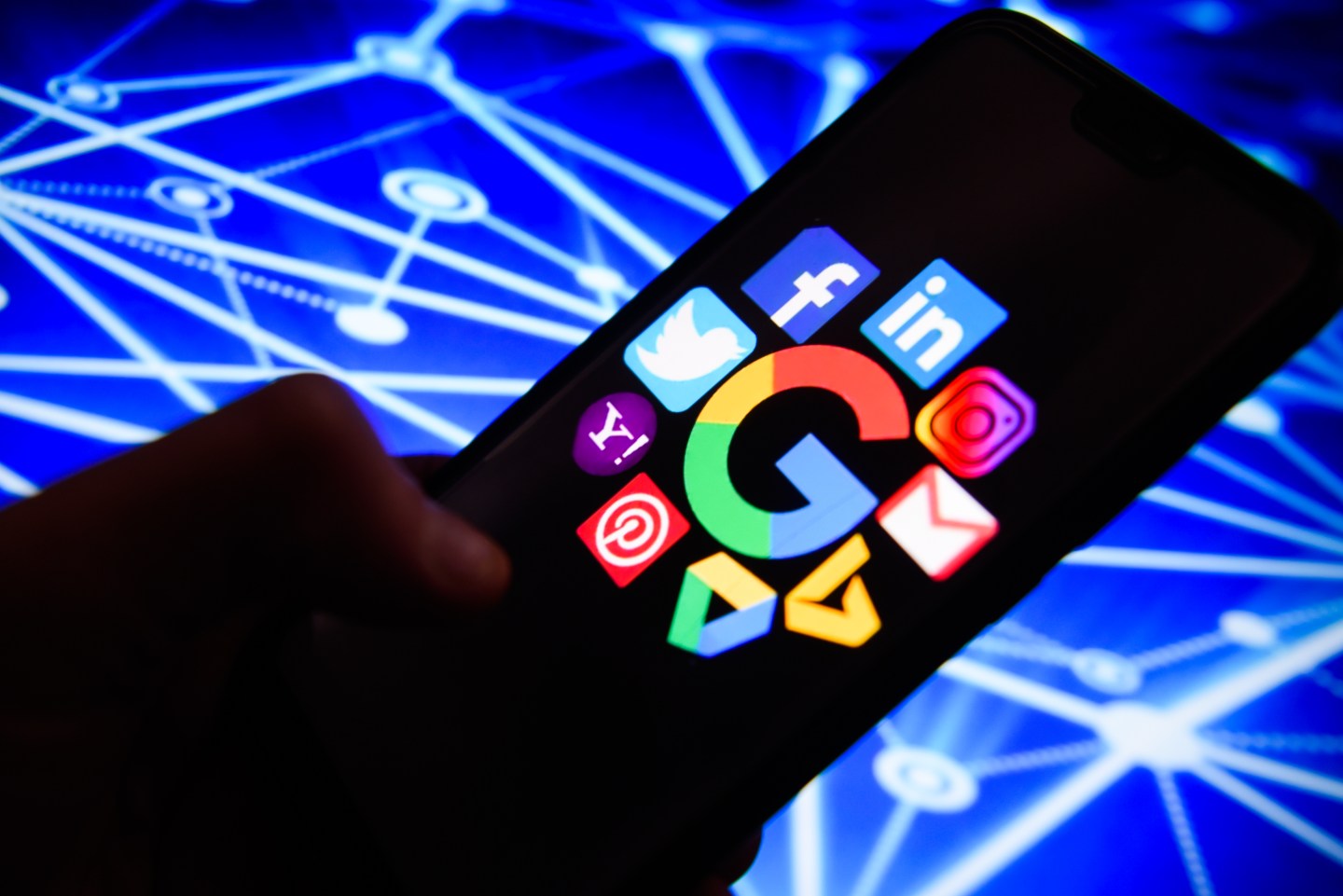 Social media logos are seen on an android mobile phone