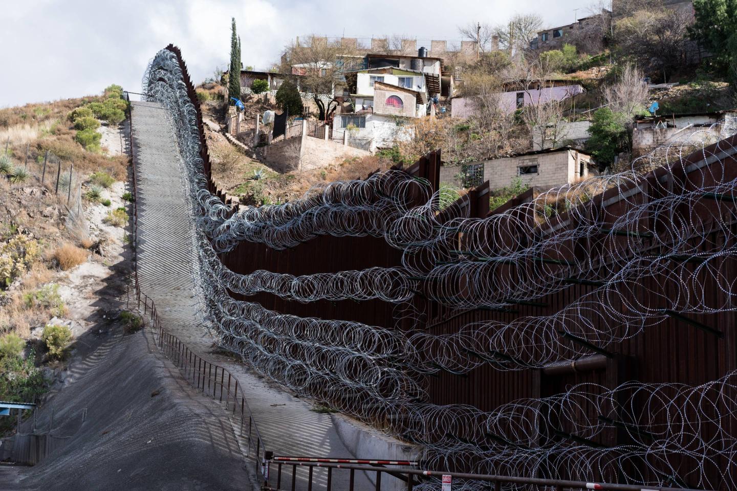 U.S. Army Troops Continue To Add Concertina Wire To Border Wall In Arizona