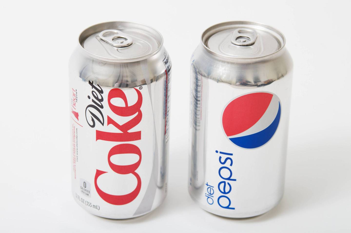 Diet versions of Coke and Pepsi Cans on White Background