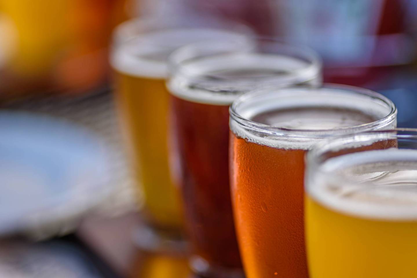 Close-Up Of Beer Glasses On Table