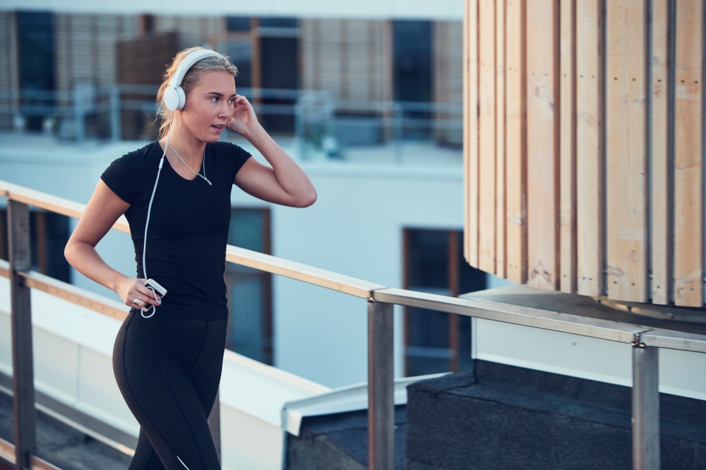 Woman with headphones jogging