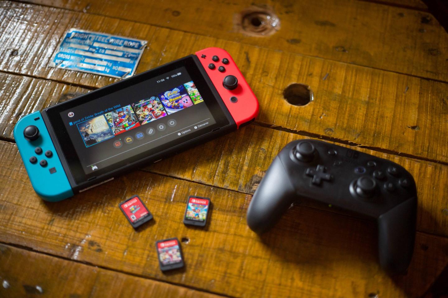 A turned on Nintendo Switch with 2 Joy-Con attached on it, a