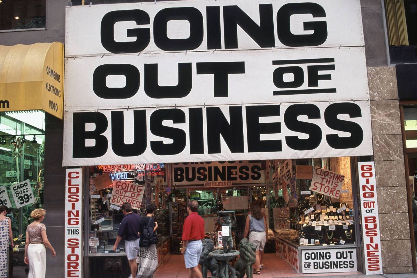 A store is going out of business on 5th Avenue in New York City.