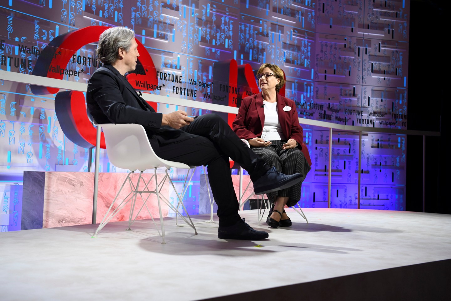 Nancy Seruto (right), executive producer for Walt Disney Imagineering, with Fortune's Clay Chandler at the 2019 Fortune Brainstorm Design conference in Singapore.