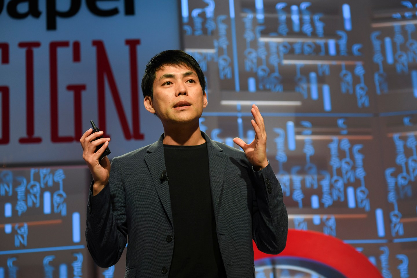 OMA architect Shohei Shigematsu speaking at the 2019 Fortune Brainstorm Design conference in Singapore.