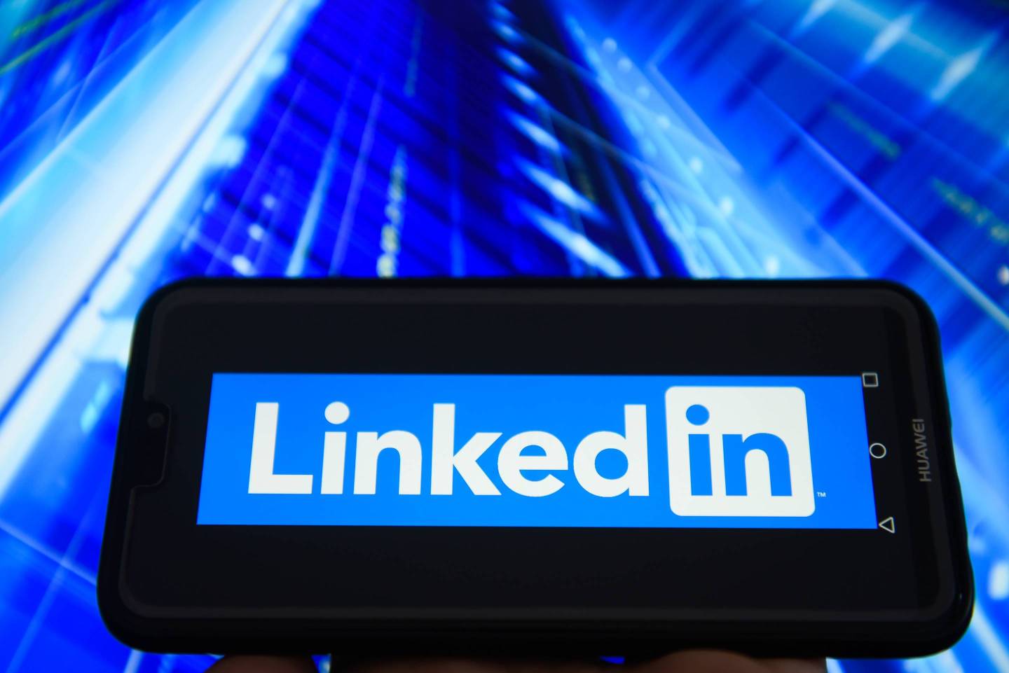 LinkedIn logo is seen on an Android mobile device