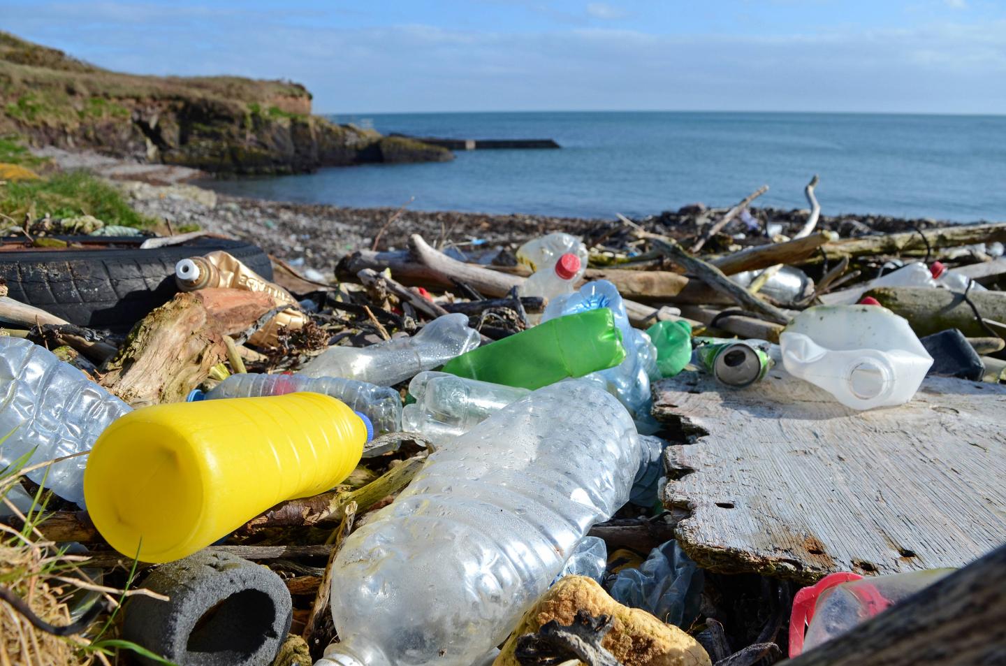 discarded plastic waste washed up on the beach at trabolgan on the southwest coast of Ireland
