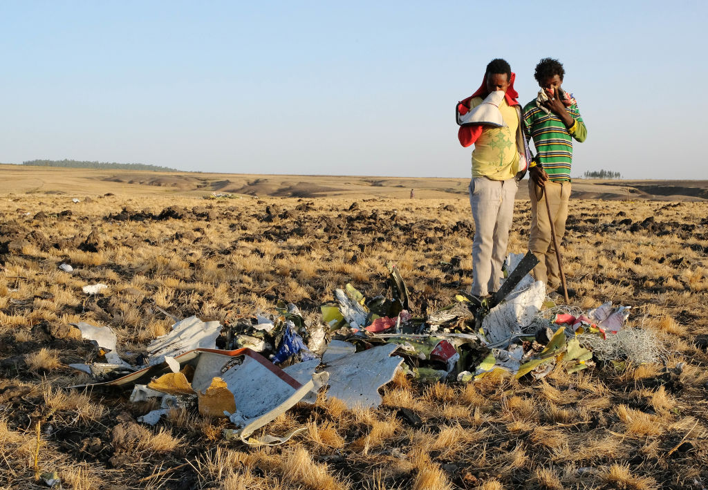 Workers Attend The Crash Site Of Ethiopian Airlines ET302 Flight To Nairobi