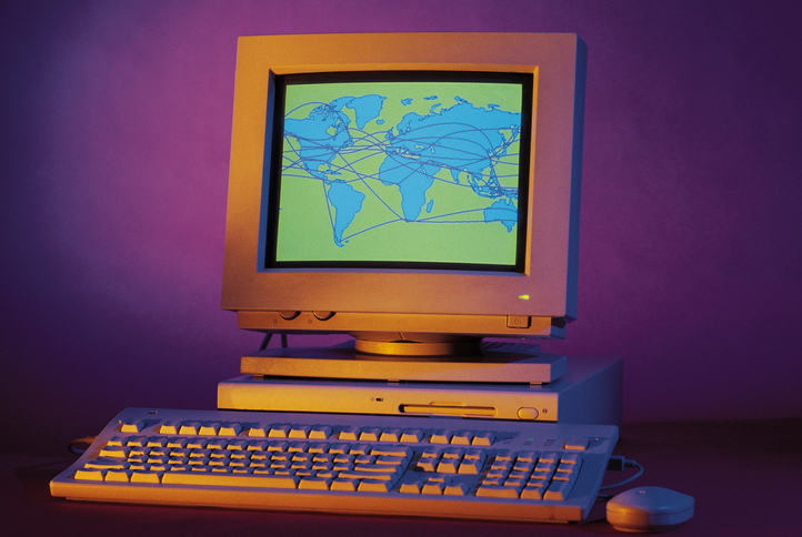 Desktop computer with graphics displaying the world