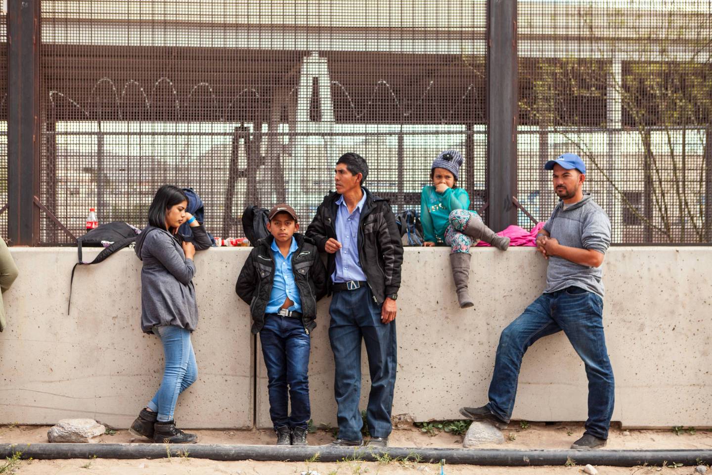 U.S. Customs And Border Protection Agency Holding Detained Migrants Under Bridge In El Paso