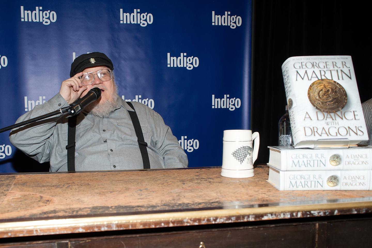 George R.R. Martin Signs Copies Of His New Book "A Dance With Dragons"