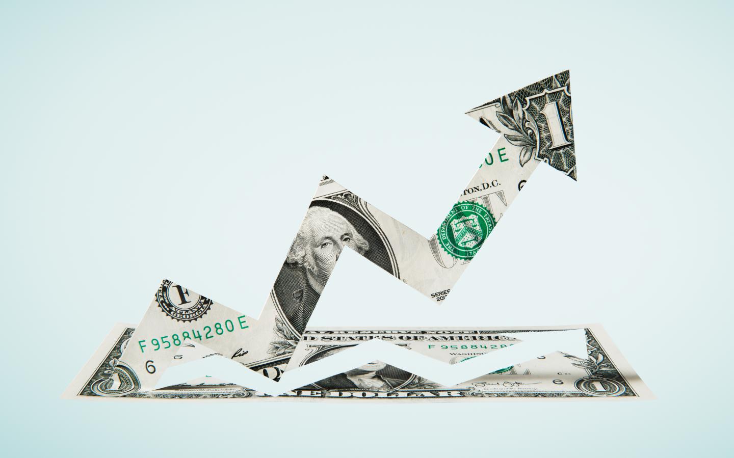 Paper-cut dollar - Upwards arrow.