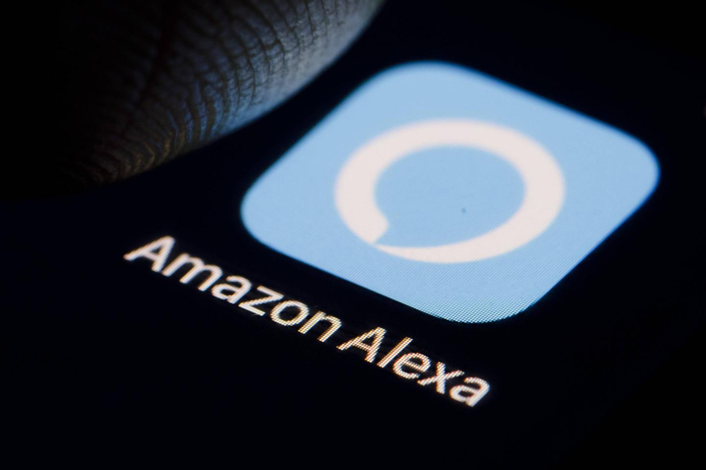 The logo of virtual assistant Amazon Alexa is displayed on a smartphone.