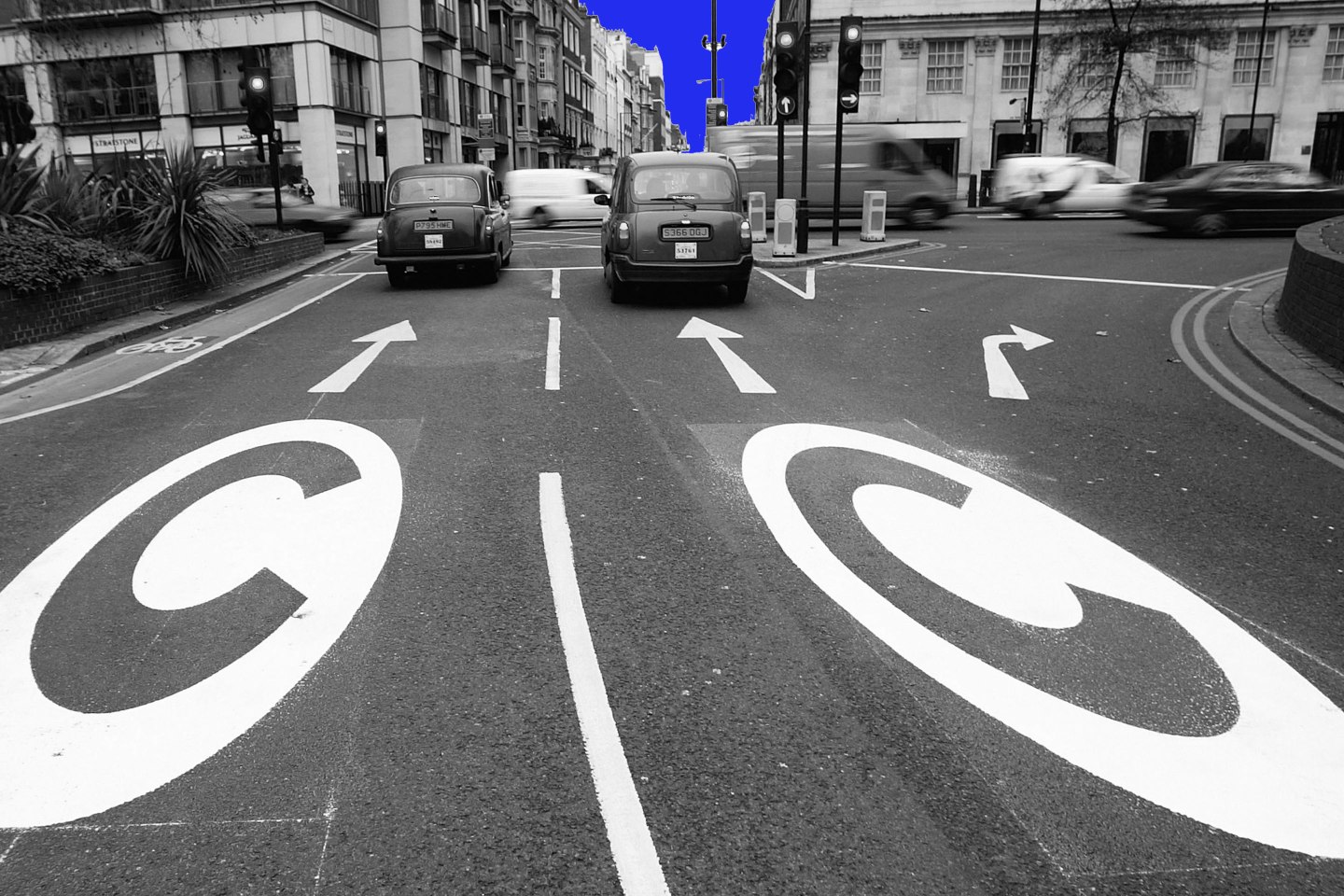 The letter "C" is painted on the road to inform motorists that they are about to enter the new congestion charge zone in London.
Scott Barbour—Getty Images