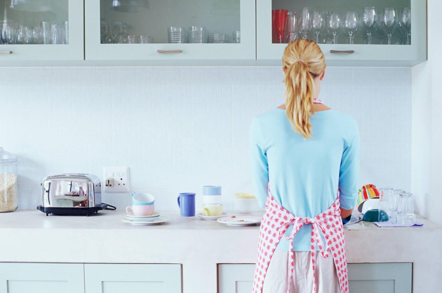 Woman washing up