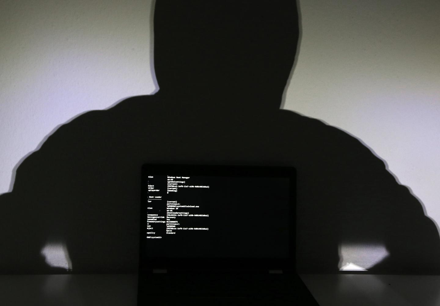 Hacker in front of the screen