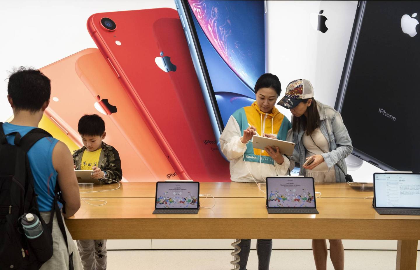 Buyers seen using ipad products at an American multinational