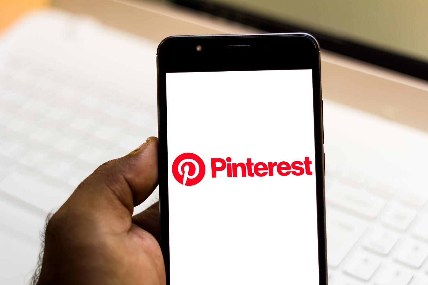 In this photo illustration the Pinterest logo is seen
