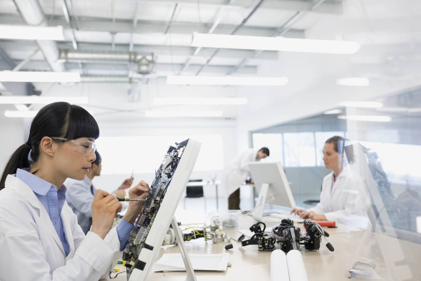 Engineer assembling computer parts
