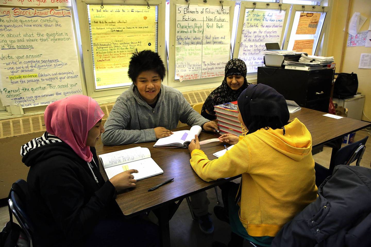 Students wait for New York City Schools Chancellor Carmen Farina to arrive on April 7, 2014.