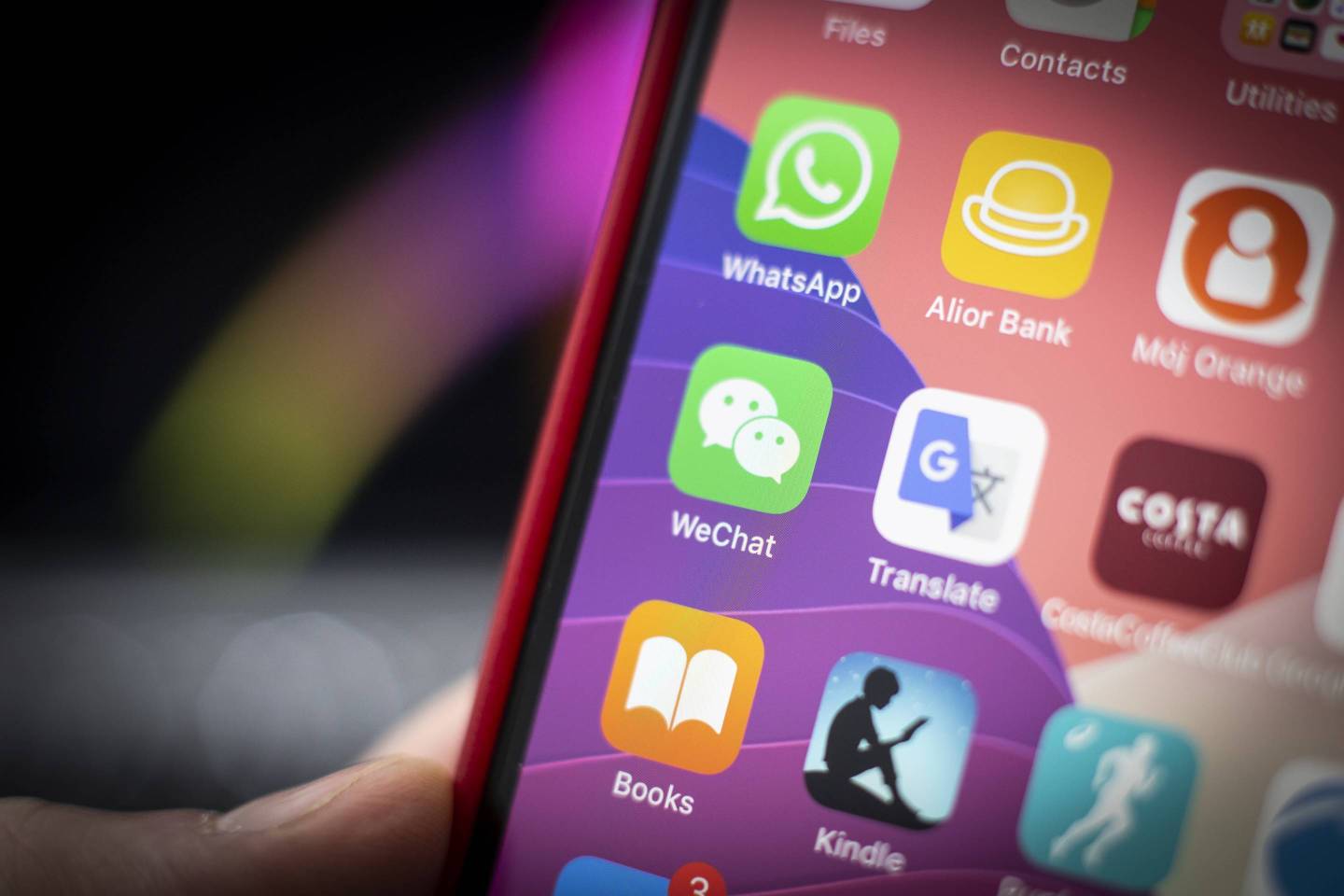 The WeChat app is seen on an iPhone.