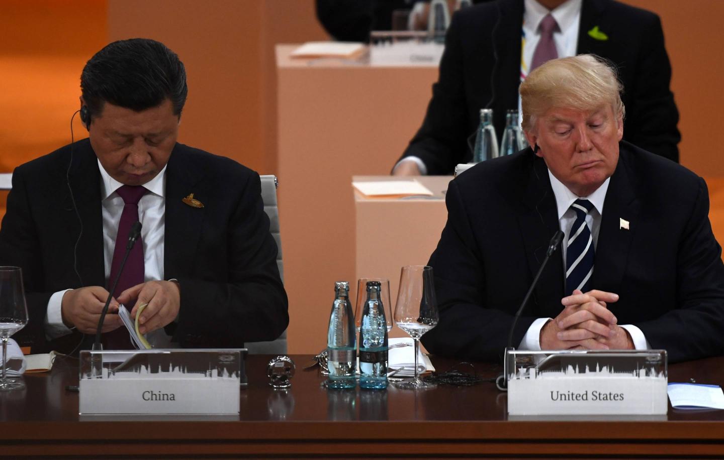 China's President Xi Jinping (L) and U.S. President Donald Trump at the G20 summit in Hamburg, Germany, on July 7, 2017