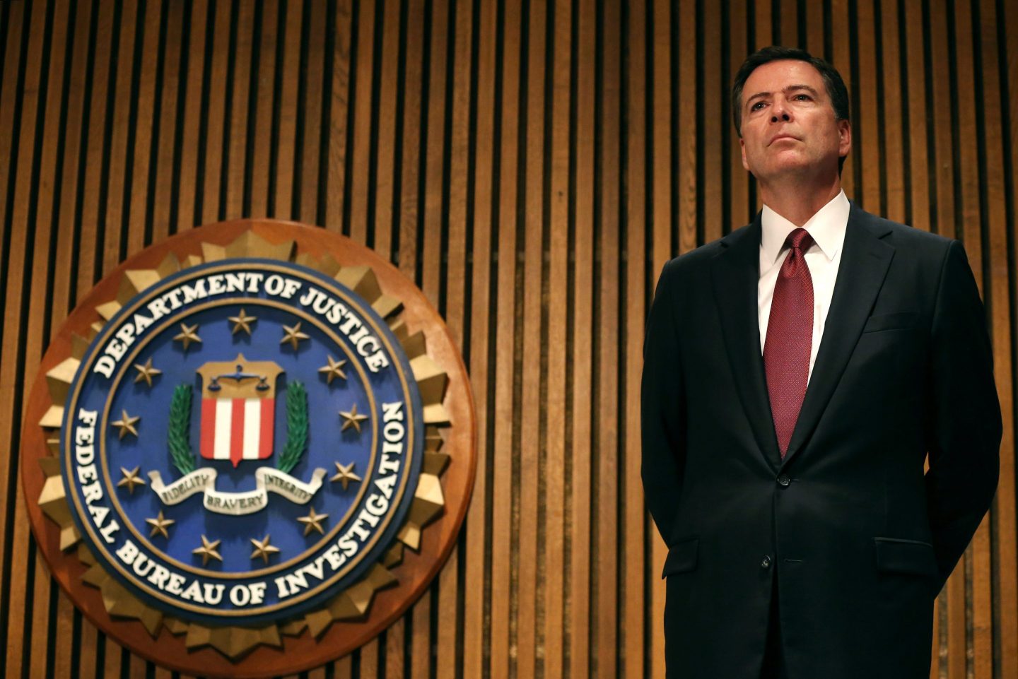 FBI Director James Comey participates in a news conference at FBI headquarters, June 23, 2014, in Washington, D.C.