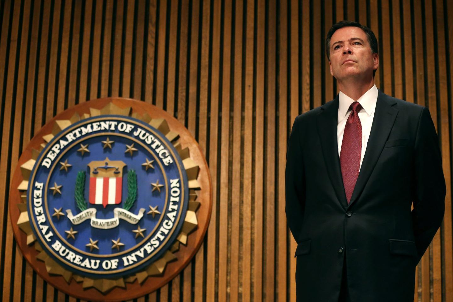 FBI Director James Comey participates in a news conference at FBI headquarters, June 23, 2014, in Washington, D.C.
