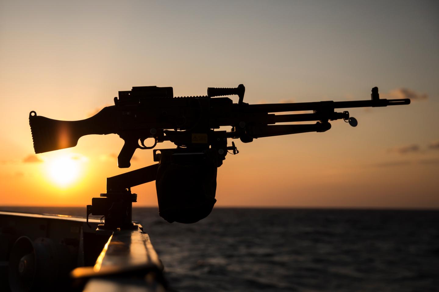 he sun sets seen from the deck of British Royal Navy's HMS Montrose frigate