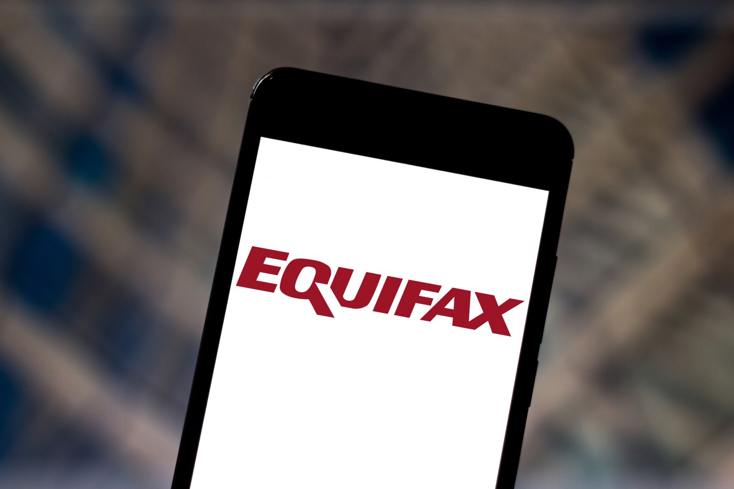 BRAZIL - 2019/05/31: In this photo illustration the Equifax logo is seen displayed on a smartphone.