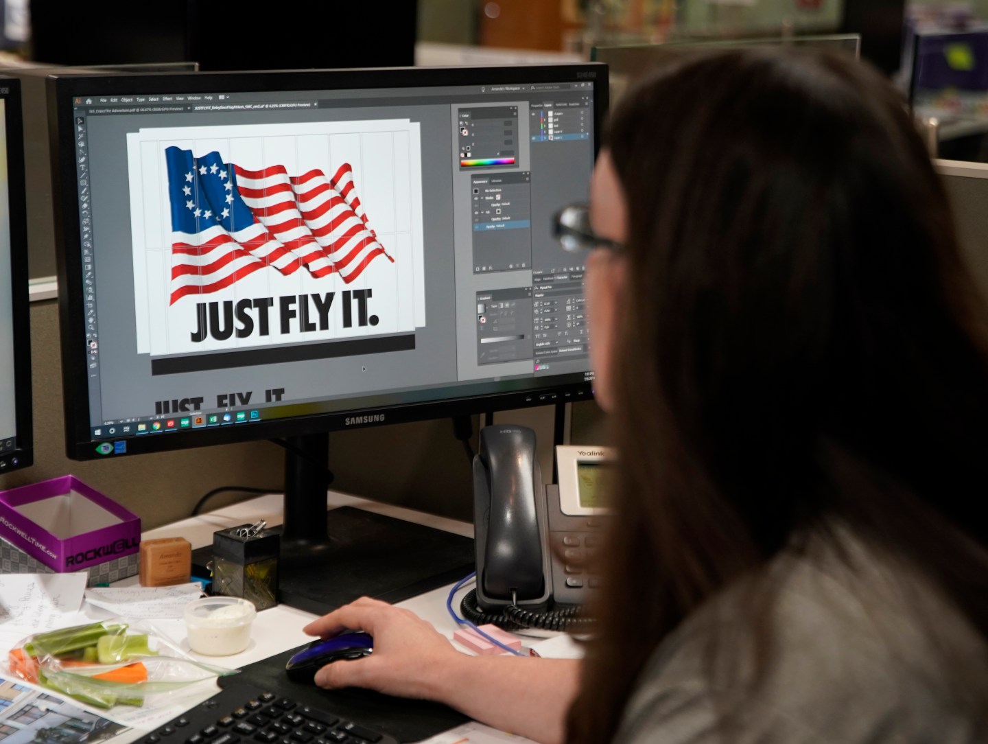 A worker designs a Just Fly It t-shirt with the Betsy Ross flag at Colonial Flag on July 5, 2019 in Salt Lake City, Utah.