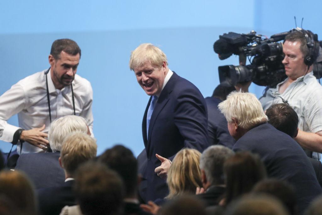Boris Johnson, leader of the Conservative Party, reacts to the announcement of winner of the Conservative Party leadership contest at the Queen Elizabeth II Conference Centre in London, U.K., on Tuesday, July 23, 2019.