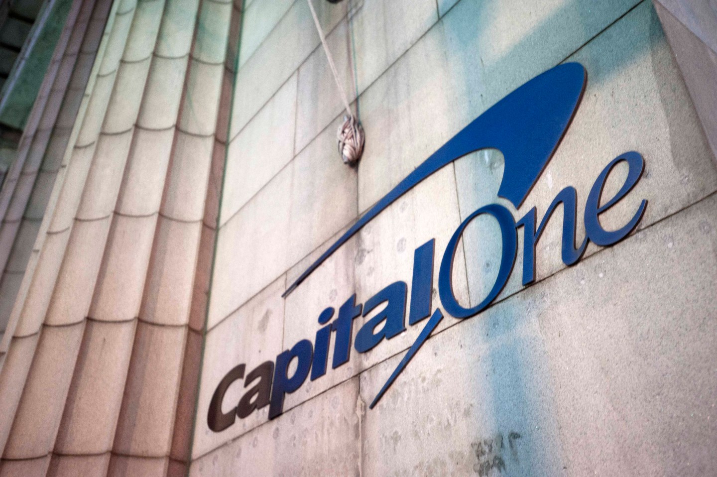 Capital One signage is displayed outside of a bank branch in the Brooklyn