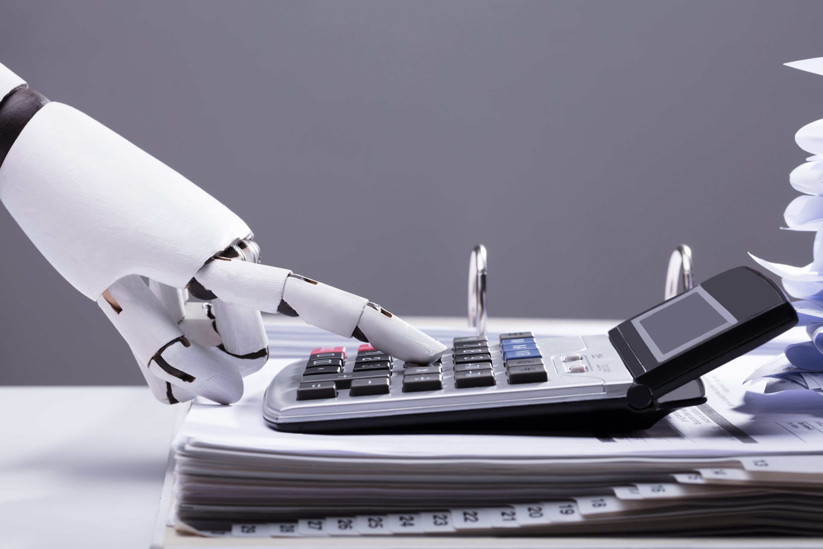 Robotic Hand Using Calculator In Office