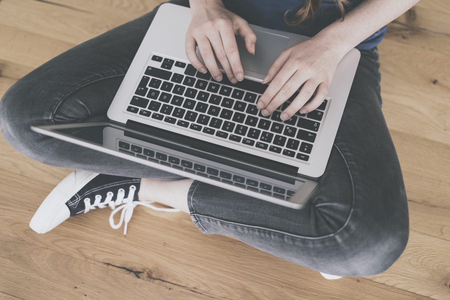 Young woman working on laptop computer