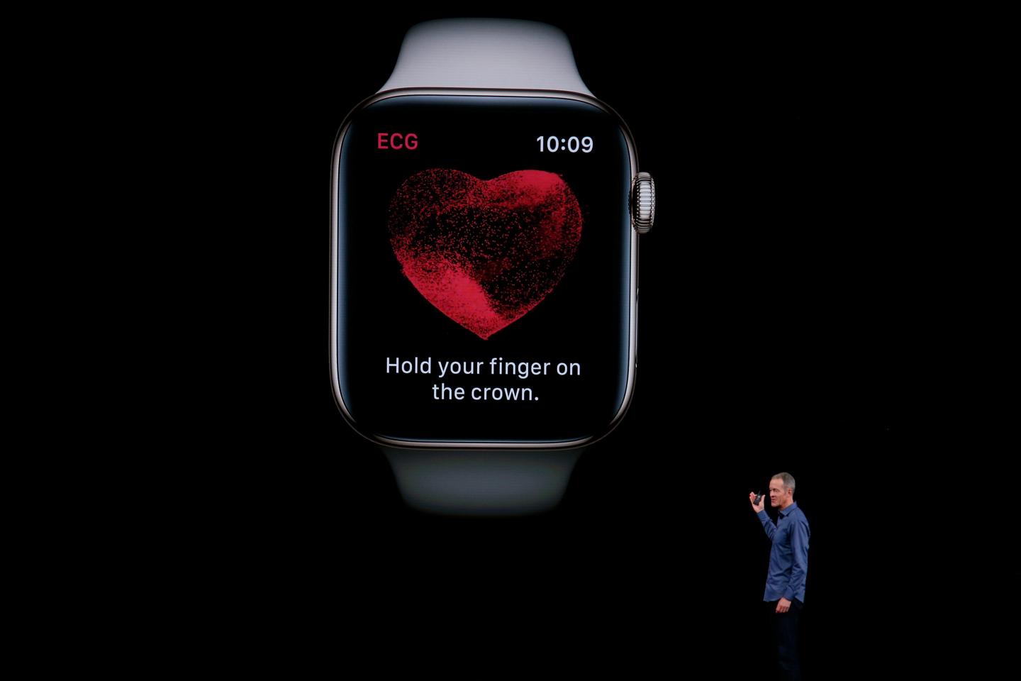 Jeff Williams introduces the new Apple Watch, capable of taking an FDA-approved electrocardiogram, at the company's annual product launch on Wednesday, Sept. 12, 2018, in Cupertino, Calif.