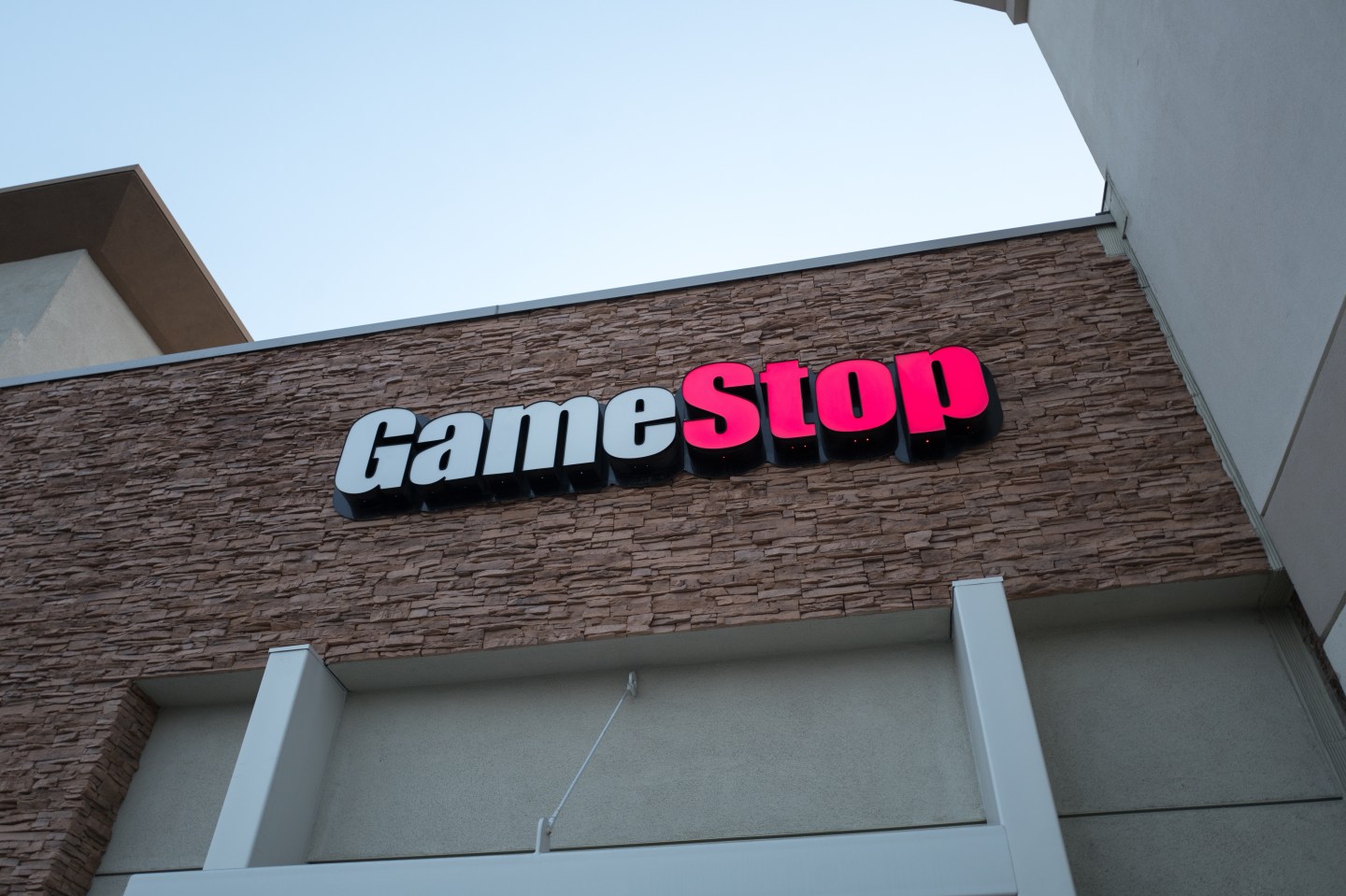 Facade with sign and logo at Game Stop video gaming store in Dublin, California, August 23, 2018.