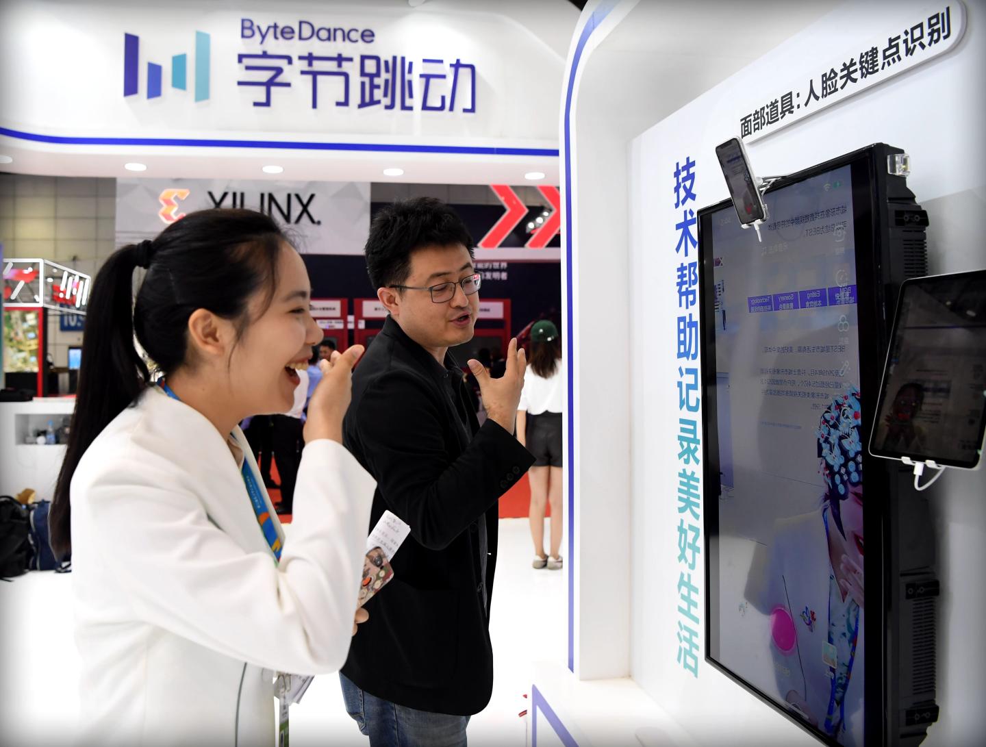 People visit a ByteDance stand