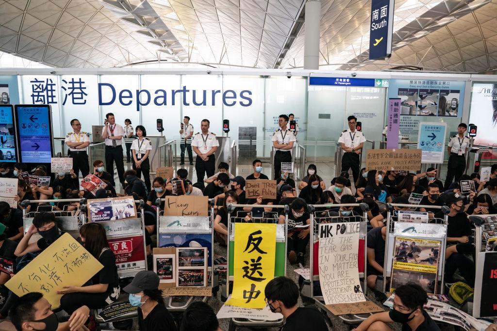 Protesters occupy the departure hall of the Hong Kong International Airport during a demonstration on August 13, 2019. Hong Kong has once again made airports the scene of political protests.