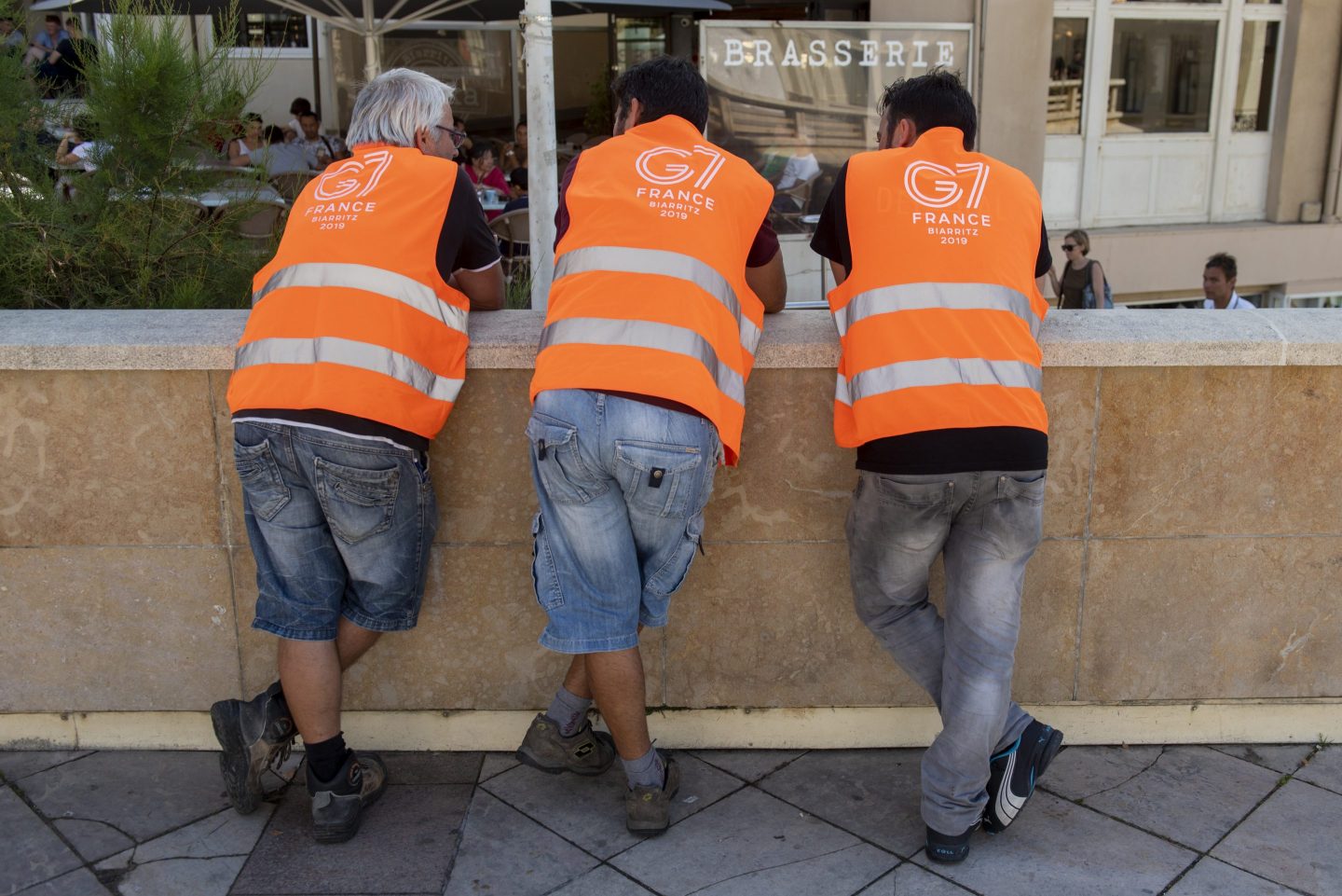 Three workers on G7 summit on August 22, 2019 in Biarritz, France.