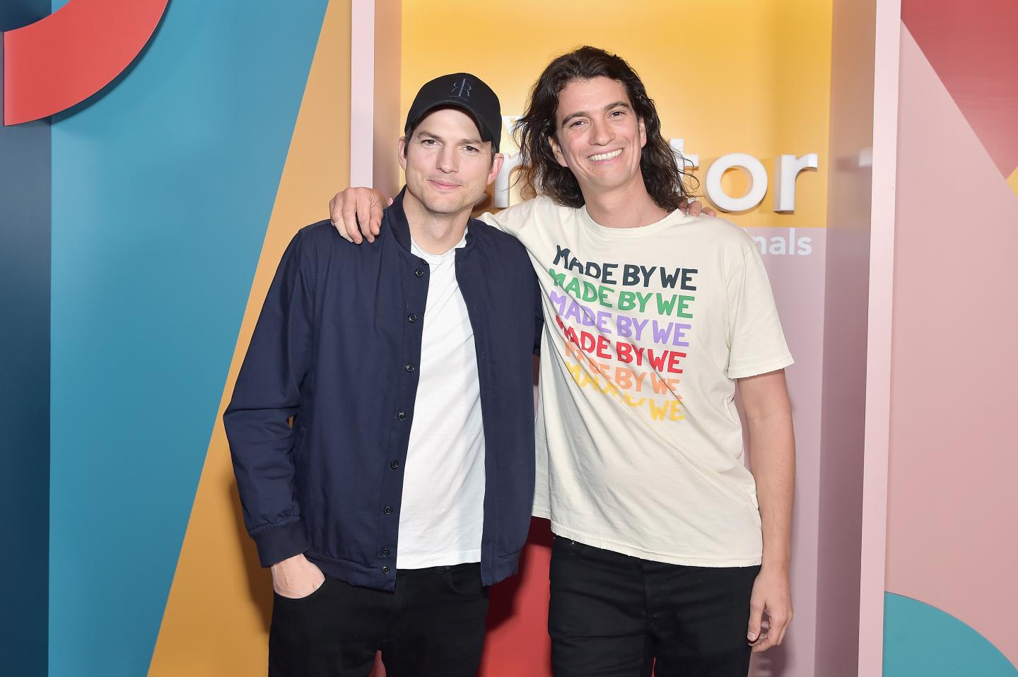 LOS ANGELES, CA - JANUARY 09: Ashton Kutcher (L) and Adam Neumann attend WeWork Presents Second Annual Creator Global Finals at Microsoft Theater on January 9, 2019 in Los Angeles, California. (Photo by Stefanie Keenan/Getty Images for WeWork)
