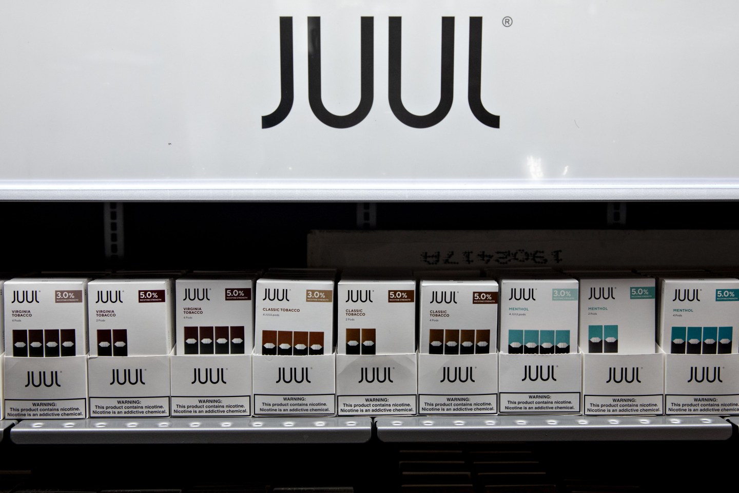 Refill pods for Juul Labs Inc. e-cigarettes are displayed for sale at a store in Princeton, Illinois, U.S., on Monday, Sept. 16, 2019. Faced with a worsening epidemic of teenage vaping and a mysterious illness stalking users of cigarette alternatives, the Trump administration promised to ratchet up its oversight of a burgeoning but increasingly troubled industry. Photographer: Daniel Acker/Bloomberg via Getty Images