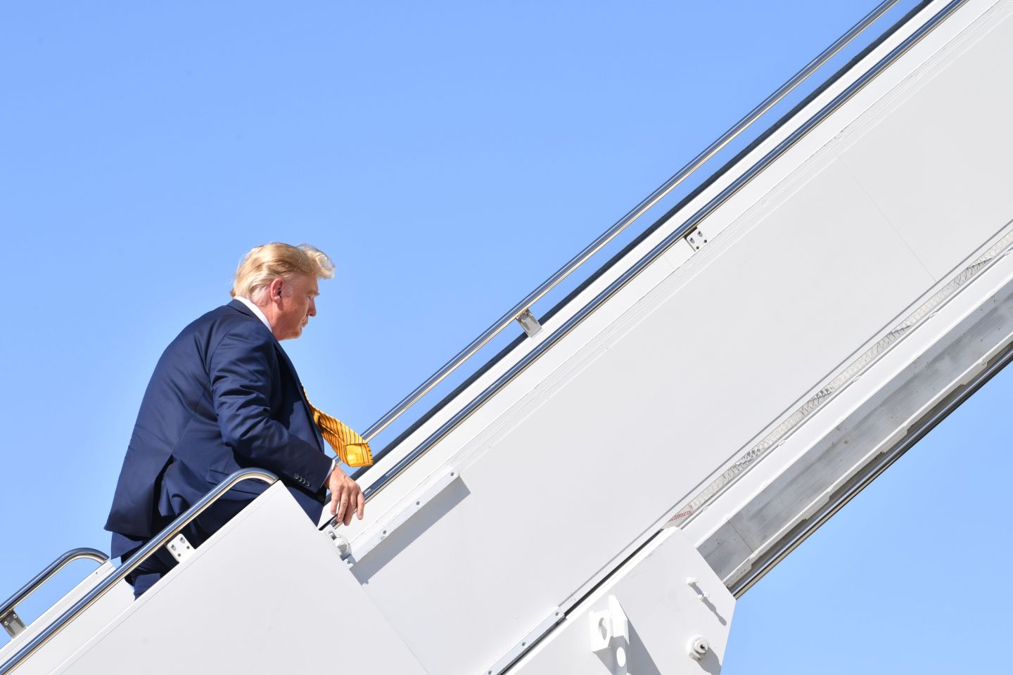 US President Donald Trump boards Air Force one as he departs from Mountain View, California on September 17, 2019.