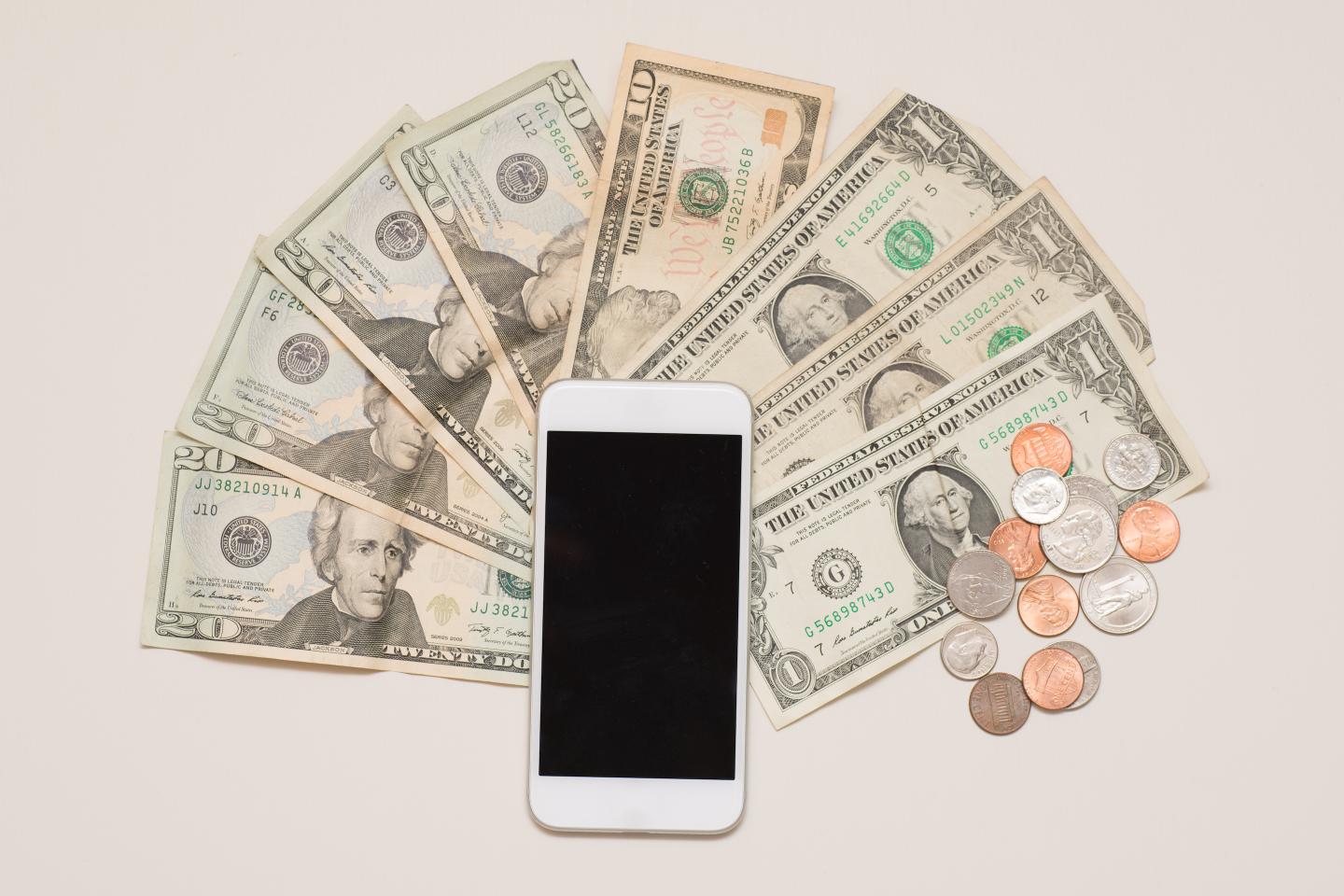 Smartphone and US Currency