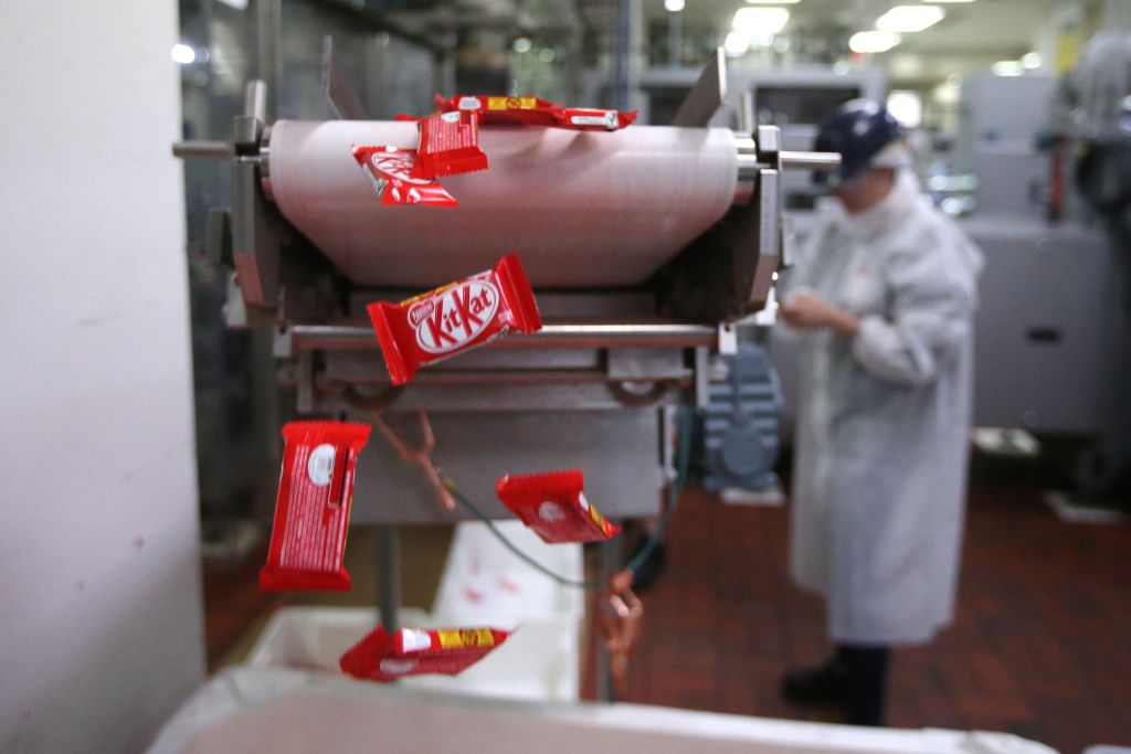 Nestlé said Thursday it would target net-zero emissions by 2050