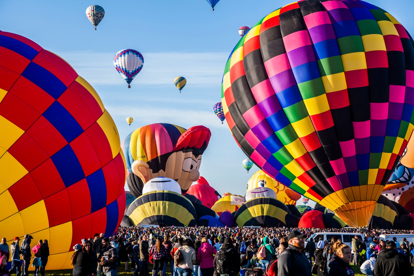 The nine-day fiesta is a sight to behold, with brightly colored balloons dotting the sky and more than 600 expert balloon pilots performing airborne tricks.
