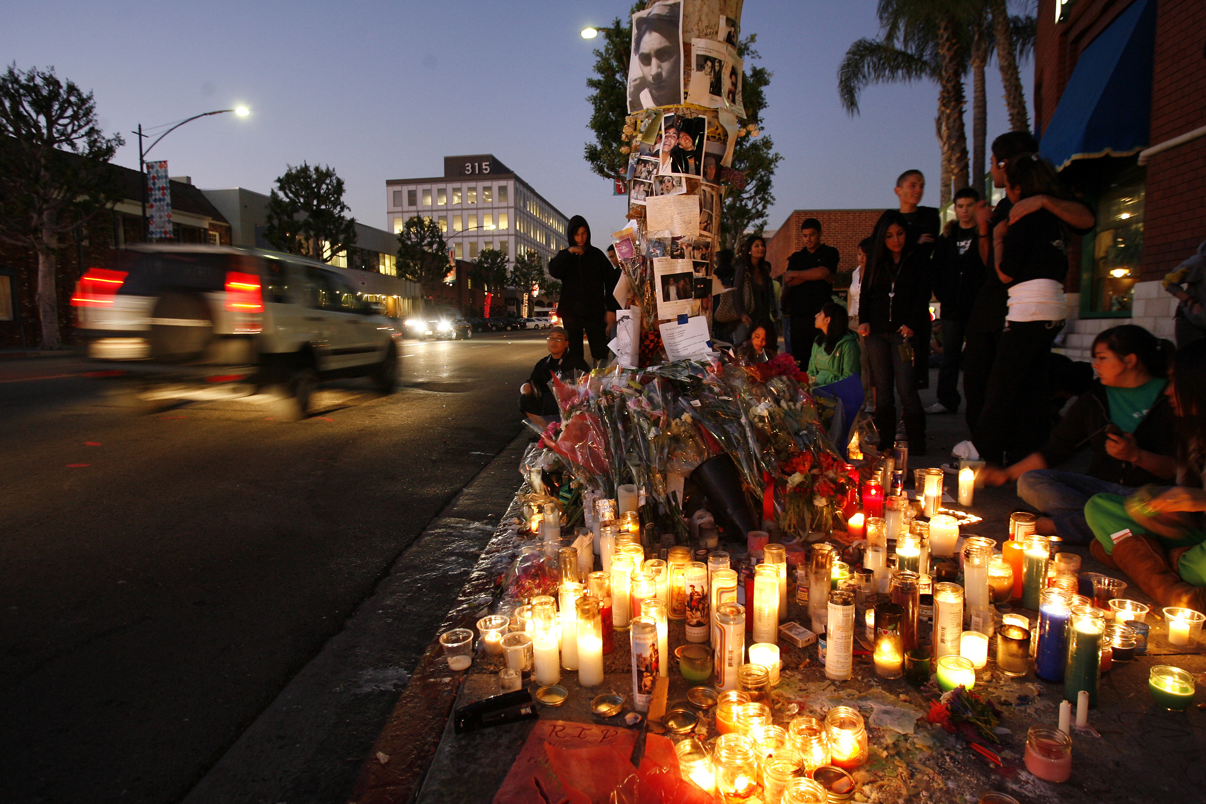Students from Beverly Hills High School and friends hold a vigil on the 300 block of S. Beverly Drive in Beverly Hills on Tuesday, December 5, 2006 for Vahagn Satian, 17, who was killed in a drunk driving traffic accident on Saturday night.